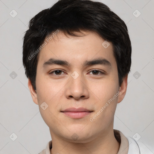 Joyful white young-adult male with short  black hair and brown eyes
