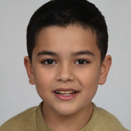 Joyful white child male with short  brown hair and brown eyes