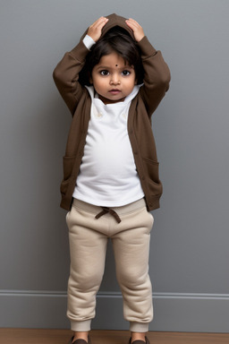 Indian infant boy with  brown hair