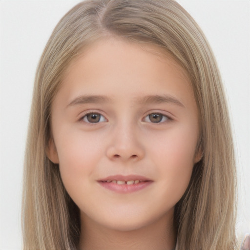 Joyful white child female with long  brown hair and brown eyes