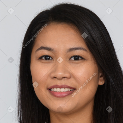 Joyful white young-adult female with long  brown hair and brown eyes