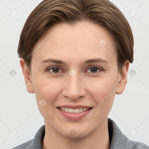 Joyful white young-adult female with short  brown hair and grey eyes