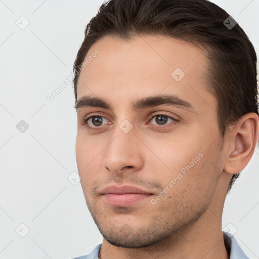 Neutral white young-adult male with short  brown hair and brown eyes