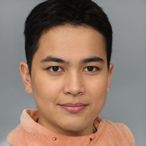 Joyful asian young-adult male with short  brown hair and brown eyes