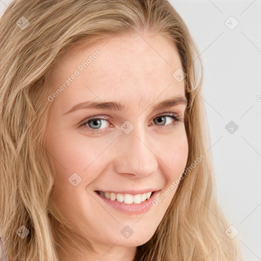 Joyful white young-adult female with long  brown hair and blue eyes