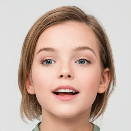 Joyful white child female with medium  brown hair and grey eyes