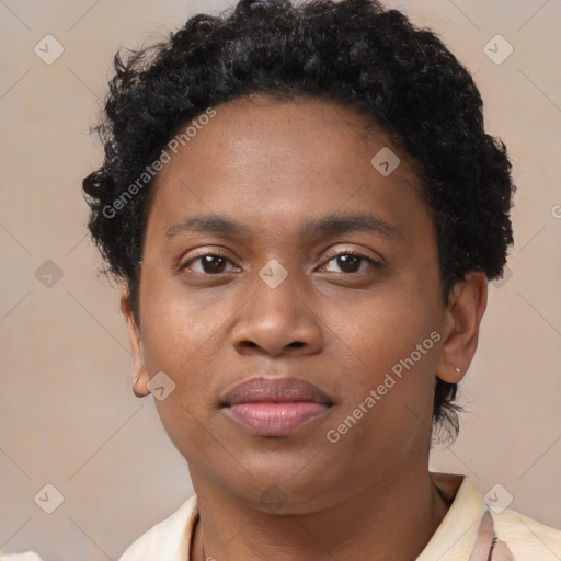 Joyful black young-adult male with short  brown hair and brown eyes