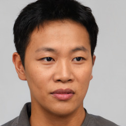 Neutral asian young-adult male with short  black hair and brown eyes