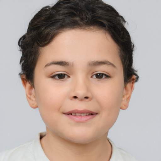 Joyful white child female with short  brown hair and brown eyes