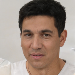 Neutral white adult male with short  black hair and brown eyes