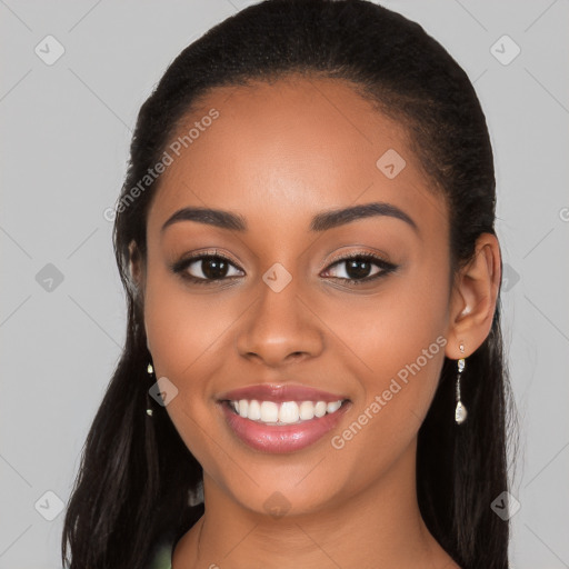 Joyful latino young-adult female with long  black hair and brown eyes