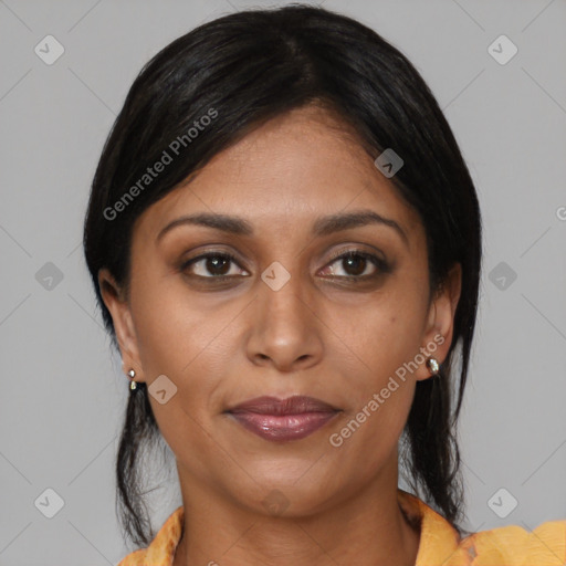 Joyful latino young-adult female with medium  brown hair and brown eyes