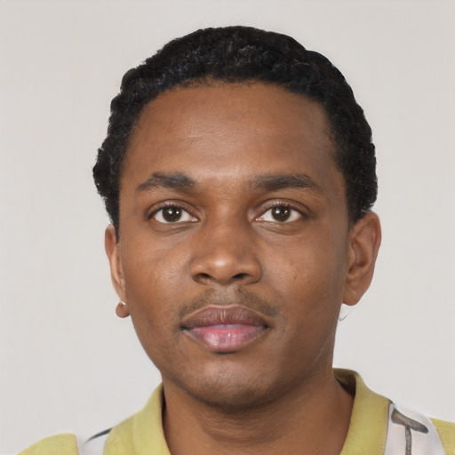 Neutral black young-adult male with short  black hair and brown eyes