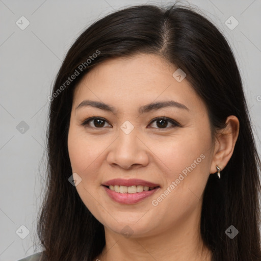 Joyful white young-adult female with long  brown hair and brown eyes