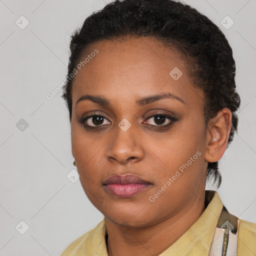 Neutral black young-adult female with short  brown hair and brown eyes