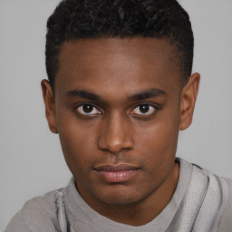 Neutral black young-adult male with short  brown hair and brown eyes