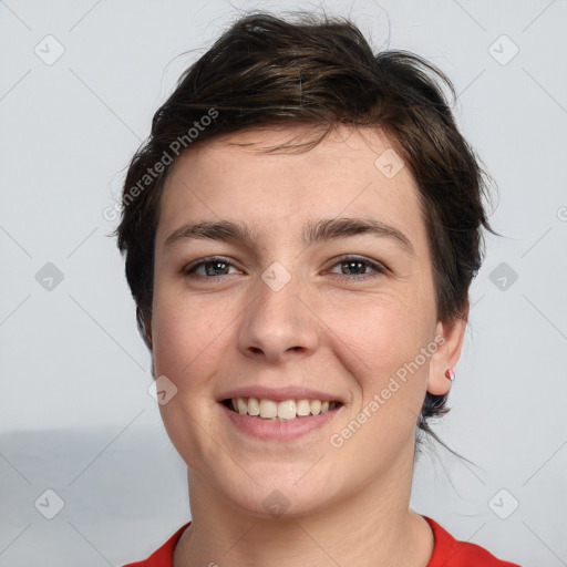 Joyful white young-adult female with short  brown hair and brown eyes