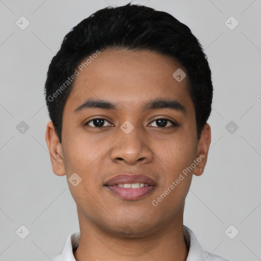 Joyful latino young-adult male with short  black hair and brown eyes