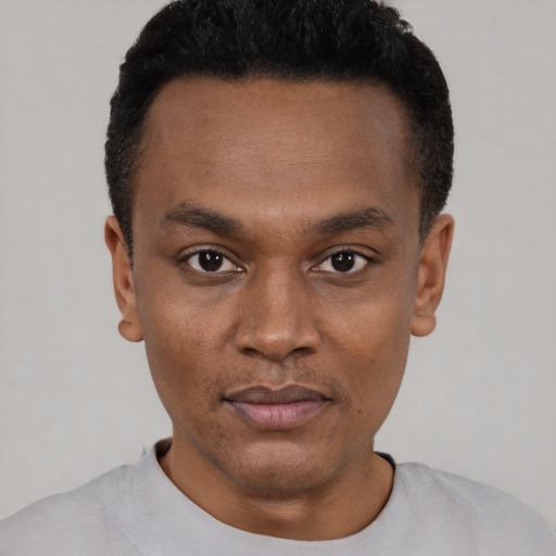 Neutral black young-adult male with short  black hair and brown eyes