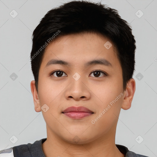 Joyful asian young-adult male with short  black hair and brown eyes