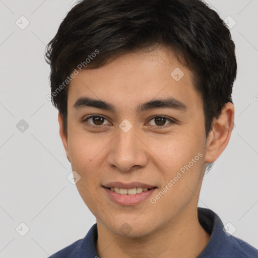 Joyful asian young-adult male with short  brown hair and brown eyes