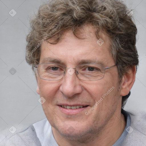 Joyful white middle-aged male with short  brown hair and blue eyes