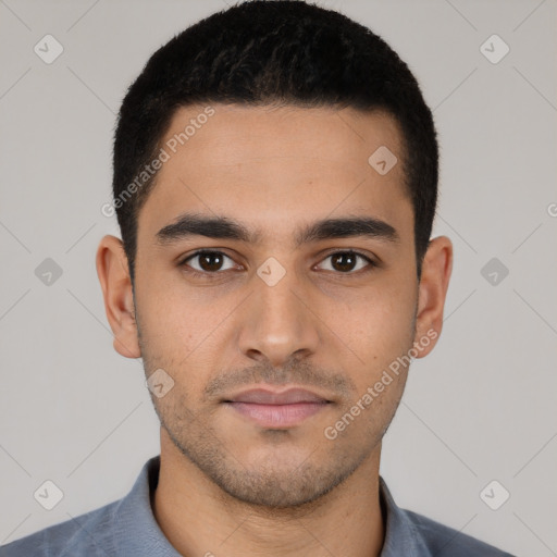 Neutral latino young-adult male with short  black hair and brown eyes