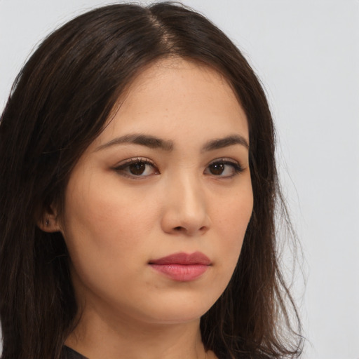 Neutral asian young-adult female with long  brown hair and brown eyes