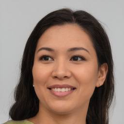 Joyful asian young-adult female with medium  brown hair and brown eyes