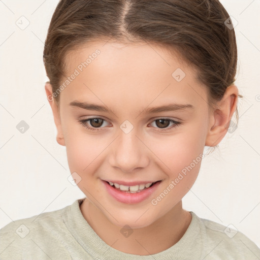 Joyful white child female with short  brown hair and brown eyes