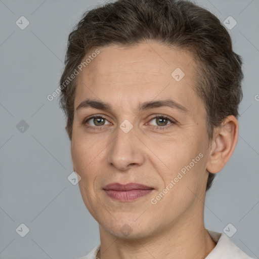 Joyful white adult female with short  brown hair and brown eyes