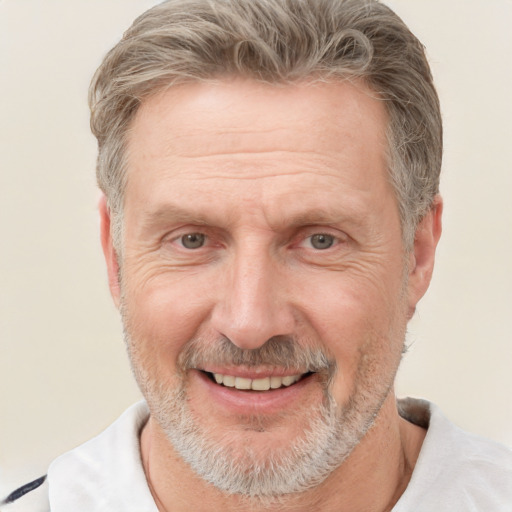 Joyful white middle-aged male with short  brown hair and brown eyes