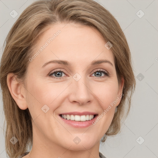 Joyful white young-adult female with medium  brown hair and blue eyes