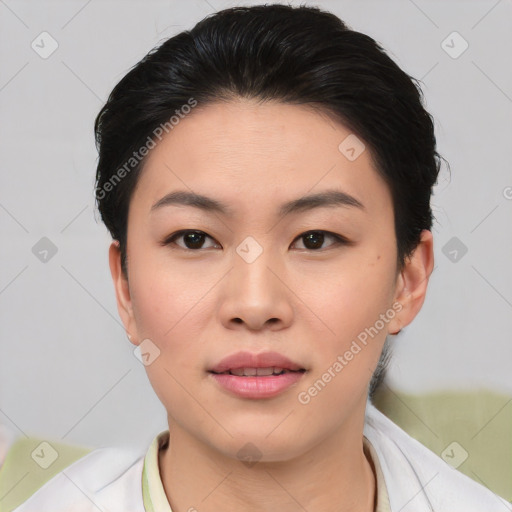 Joyful asian young-adult female with short  black hair and brown eyes