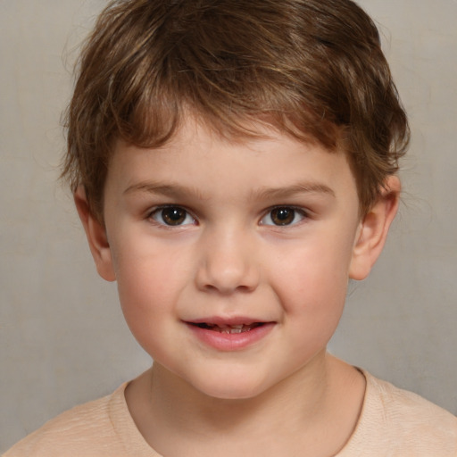 Joyful white child male with short  brown hair and brown eyes