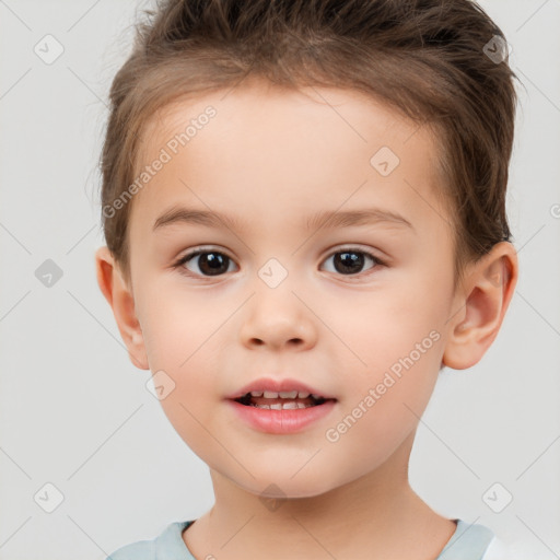 Joyful white child male with short  brown hair and brown eyes