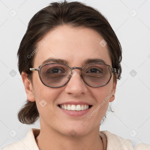 Joyful white young-adult female with medium  brown hair and blue eyes