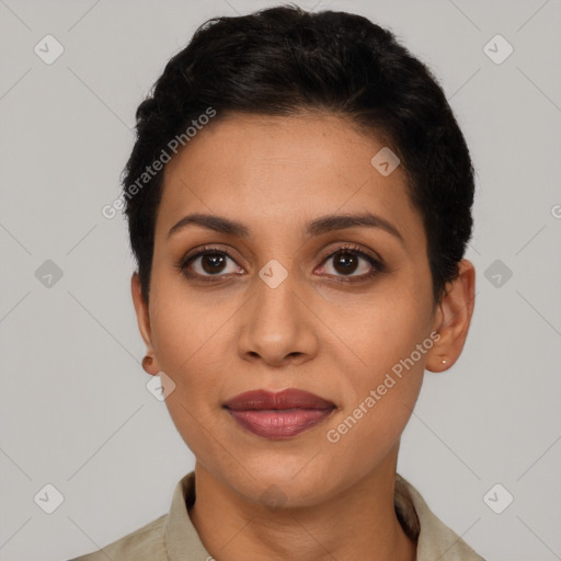 Joyful latino young-adult female with short  black hair and brown eyes