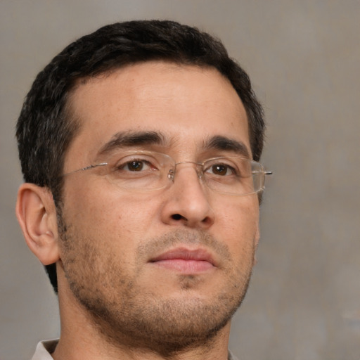 Neutral white adult male with short  brown hair and brown eyes