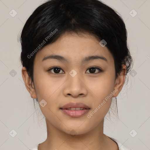 Joyful asian young-adult female with medium  black hair and brown eyes