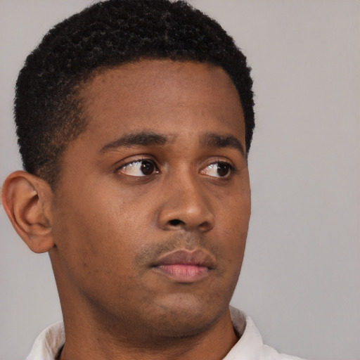 Neutral black young-adult male with short  brown hair and brown eyes
