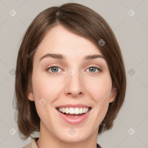 Joyful white young-adult female with medium  brown hair and green eyes