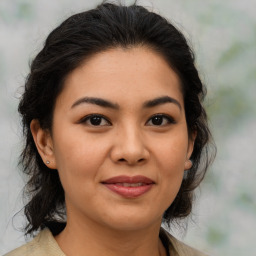 Joyful asian young-adult female with medium  brown hair and brown eyes