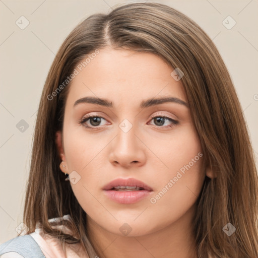 Neutral white young-adult female with long  brown hair and brown eyes