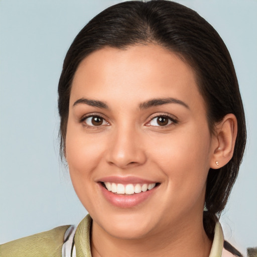 Joyful white young-adult female with medium  brown hair and brown eyes