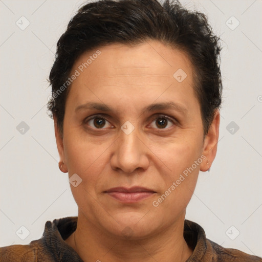 Joyful white adult female with short  brown hair and brown eyes