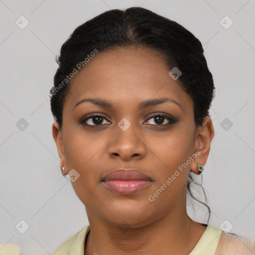 Joyful black young-adult female with short  brown hair and brown eyes