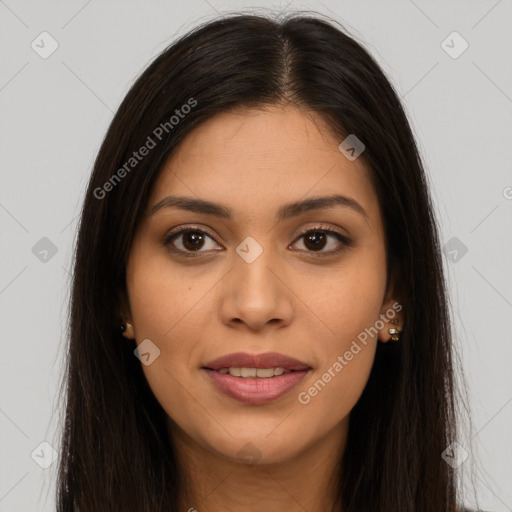 Joyful latino young-adult female with long  brown hair and brown eyes