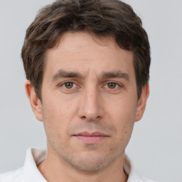 Neutral white adult male with short  brown hair and brown eyes