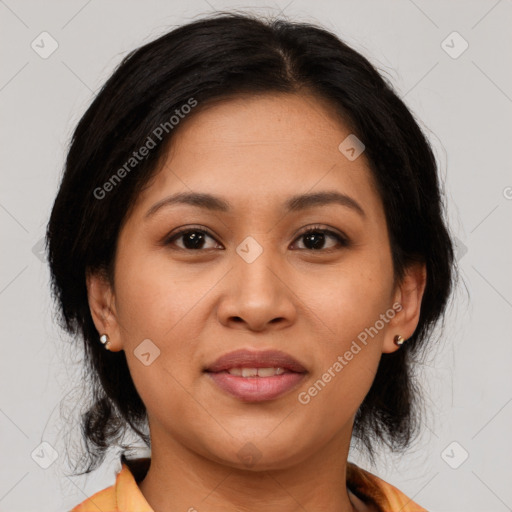 Joyful asian young-adult female with medium  brown hair and brown eyes